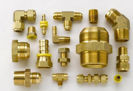 Industrial brass pipe fittings manufacturing facility at Parashar Pipes Delhi showing precision engineering and quality production