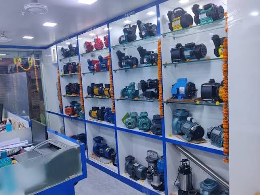 Magna Marketing water pump showroom interior with TEXMO CRI Crompton Lubi Taro Kirloskar pumps on display in Bangalore