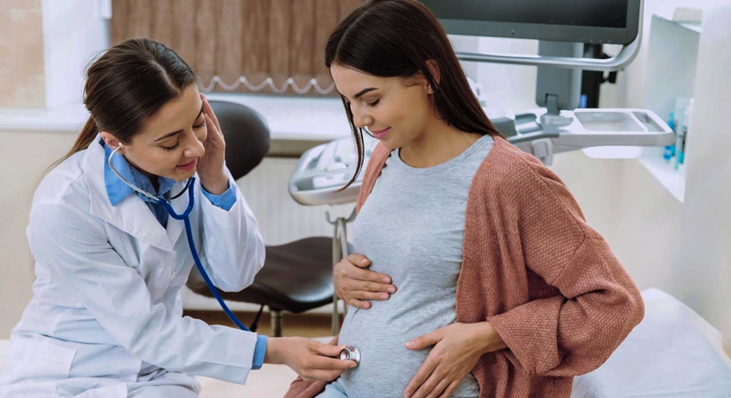 Gynaecologist consulting with a patient in a calm clinical setting