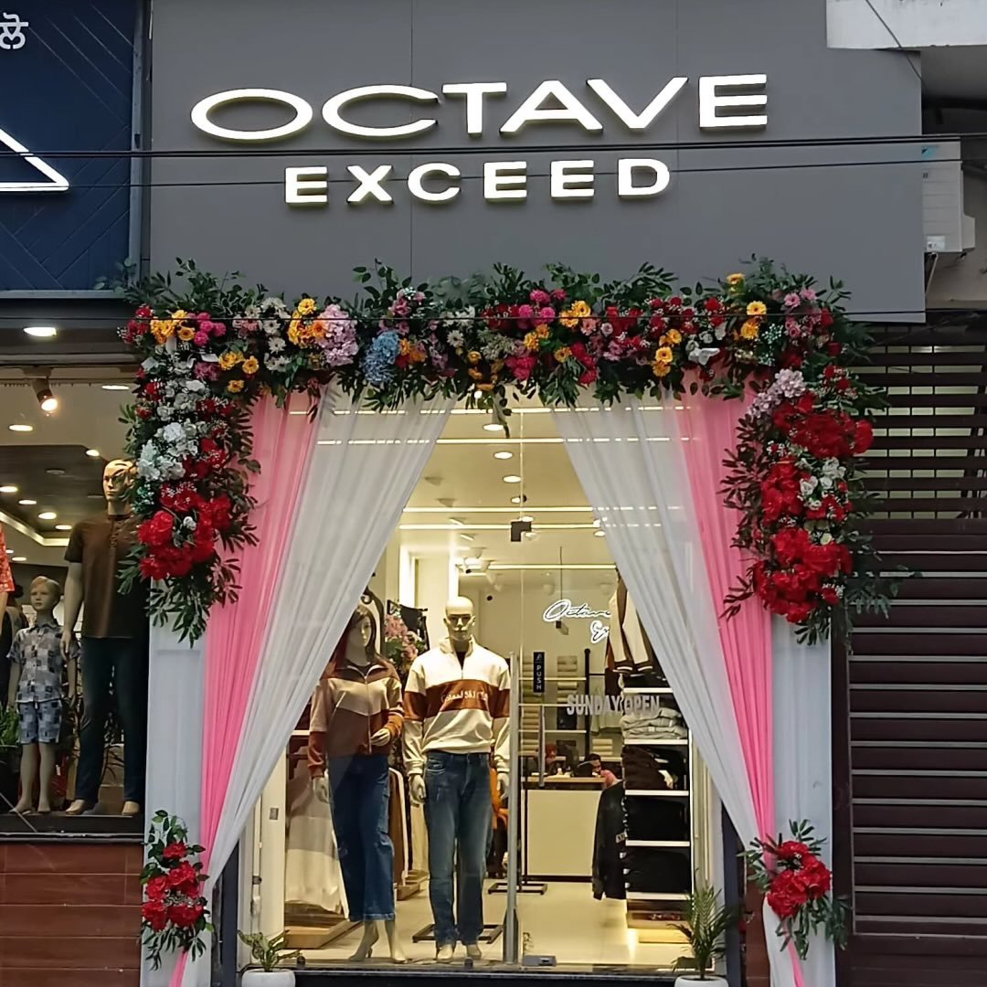 Premium brand clothing display at Octave Exceed garment showroom on Circular Road in Batala, Punjab
