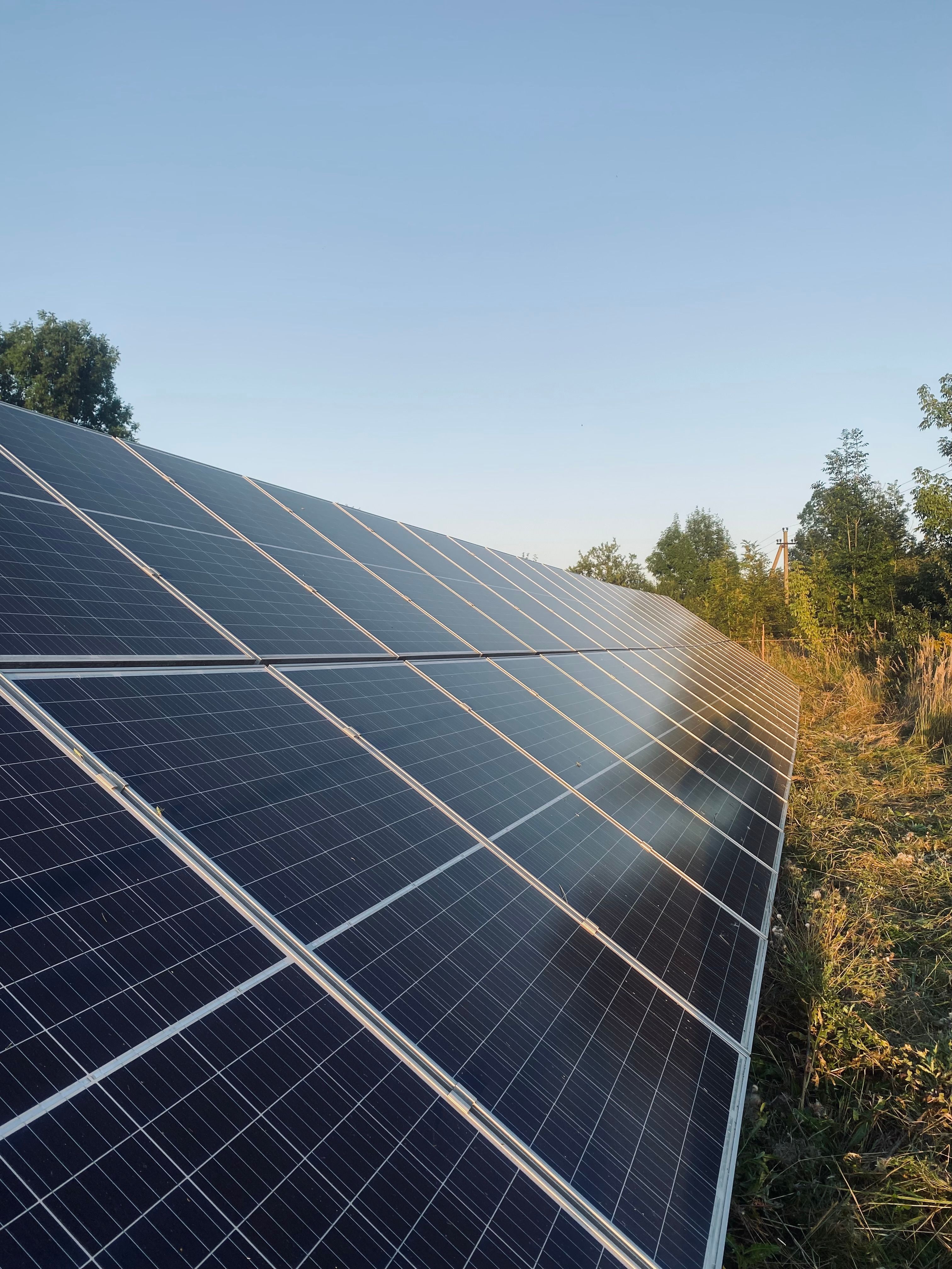High efficiency rooftop solar panels catching warm morning sunlight on a modern home in Bahraich