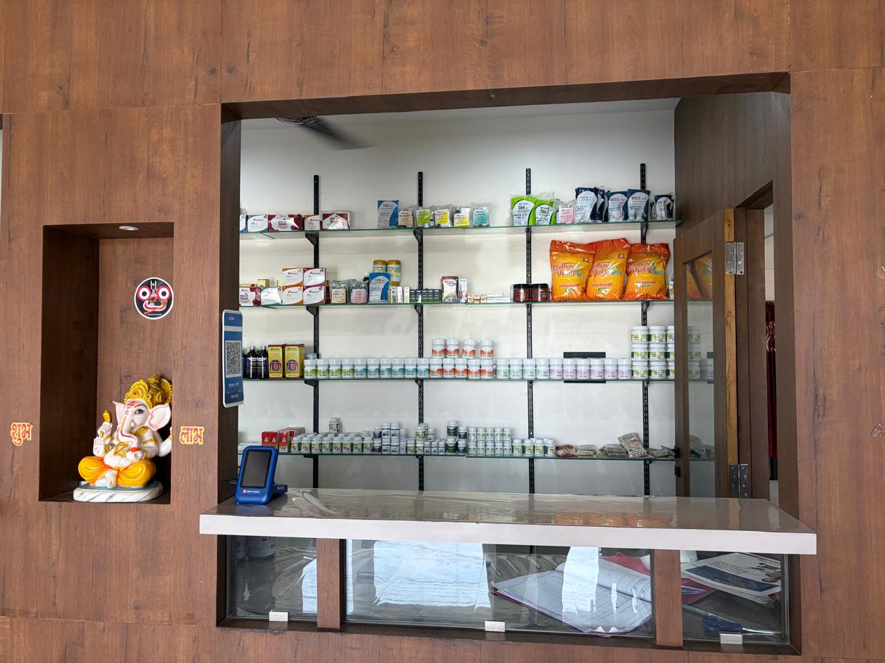 Classical Ayurvedic herbs and churna stored at the clinic pharmacy