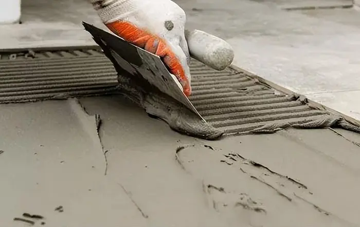 Tile adhesive and cement additives