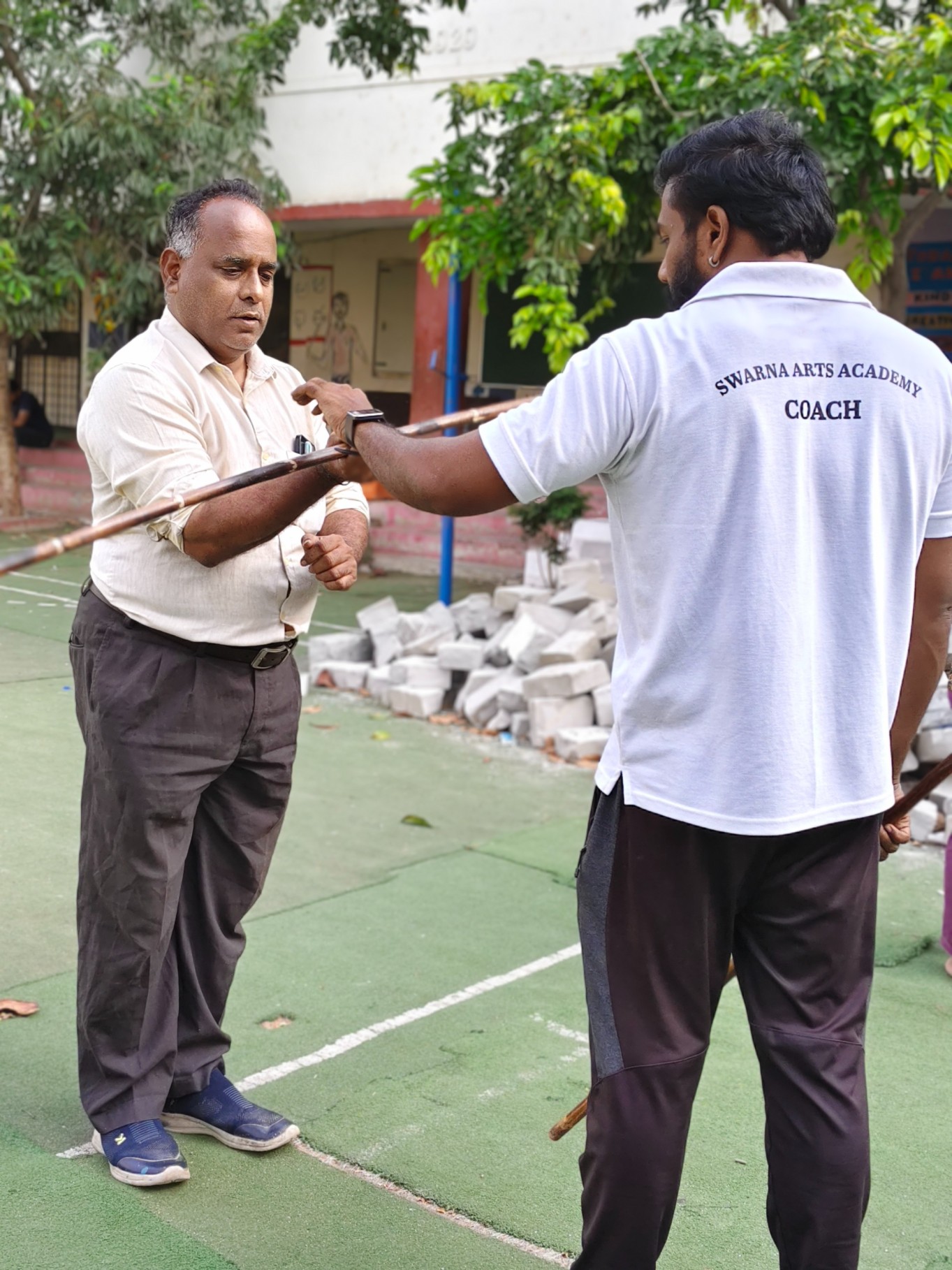 Children receiving Silambam training at Swarna Arts Academy Yousufguda