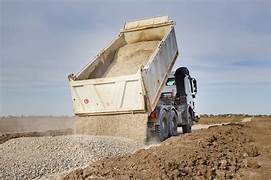 Bulk sand delivery truck at site