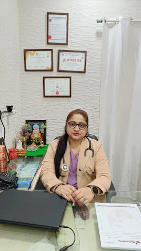 Ayurvedic Doctor consulting a patient at Madhavbaug Ayurvedic Clinic Kurla East Mumbai