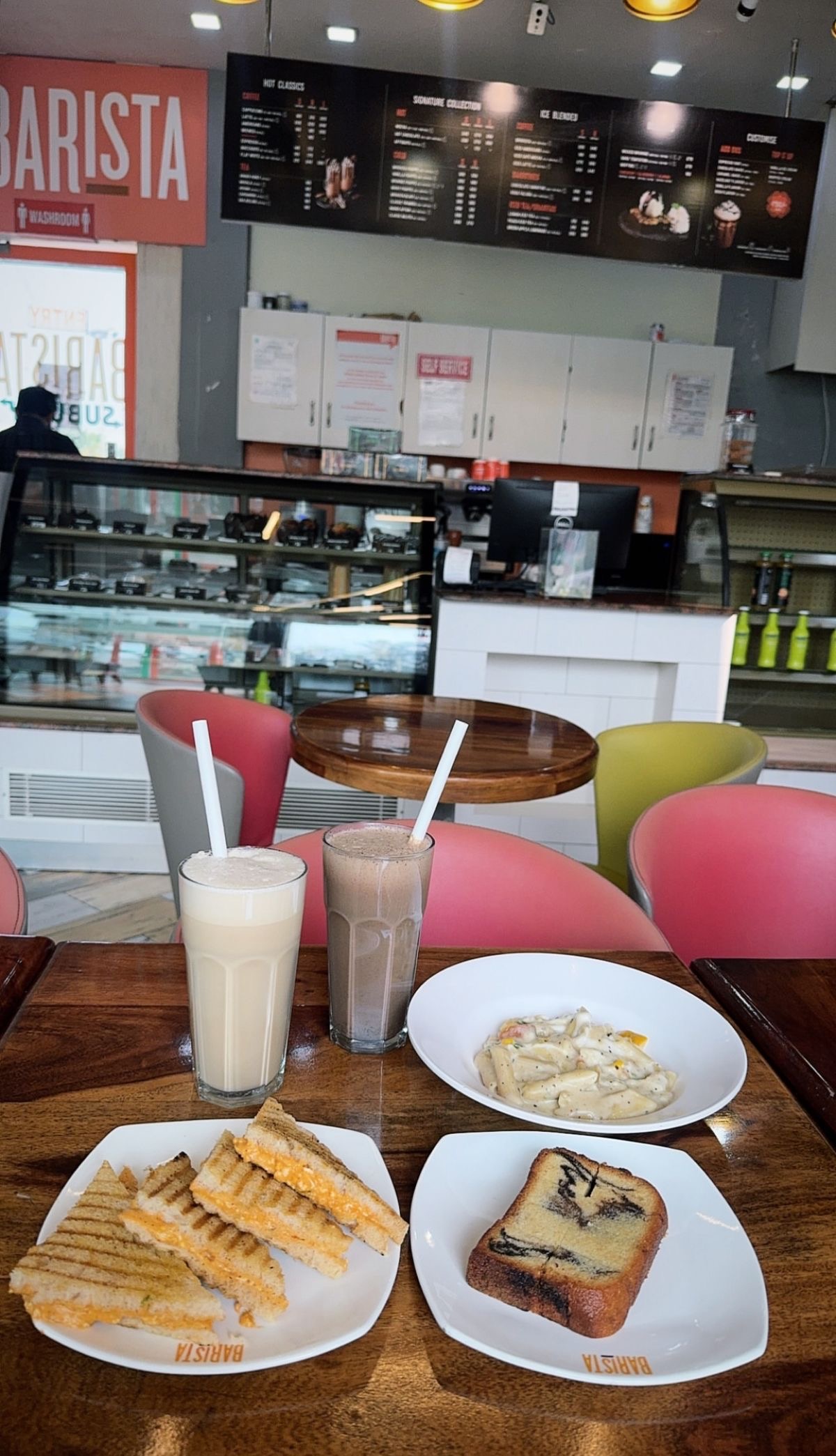 Food and drinks spread at cafe table