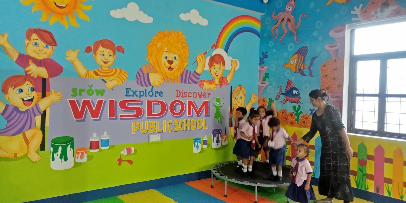 Campus building and playground view of Wisdom Public School