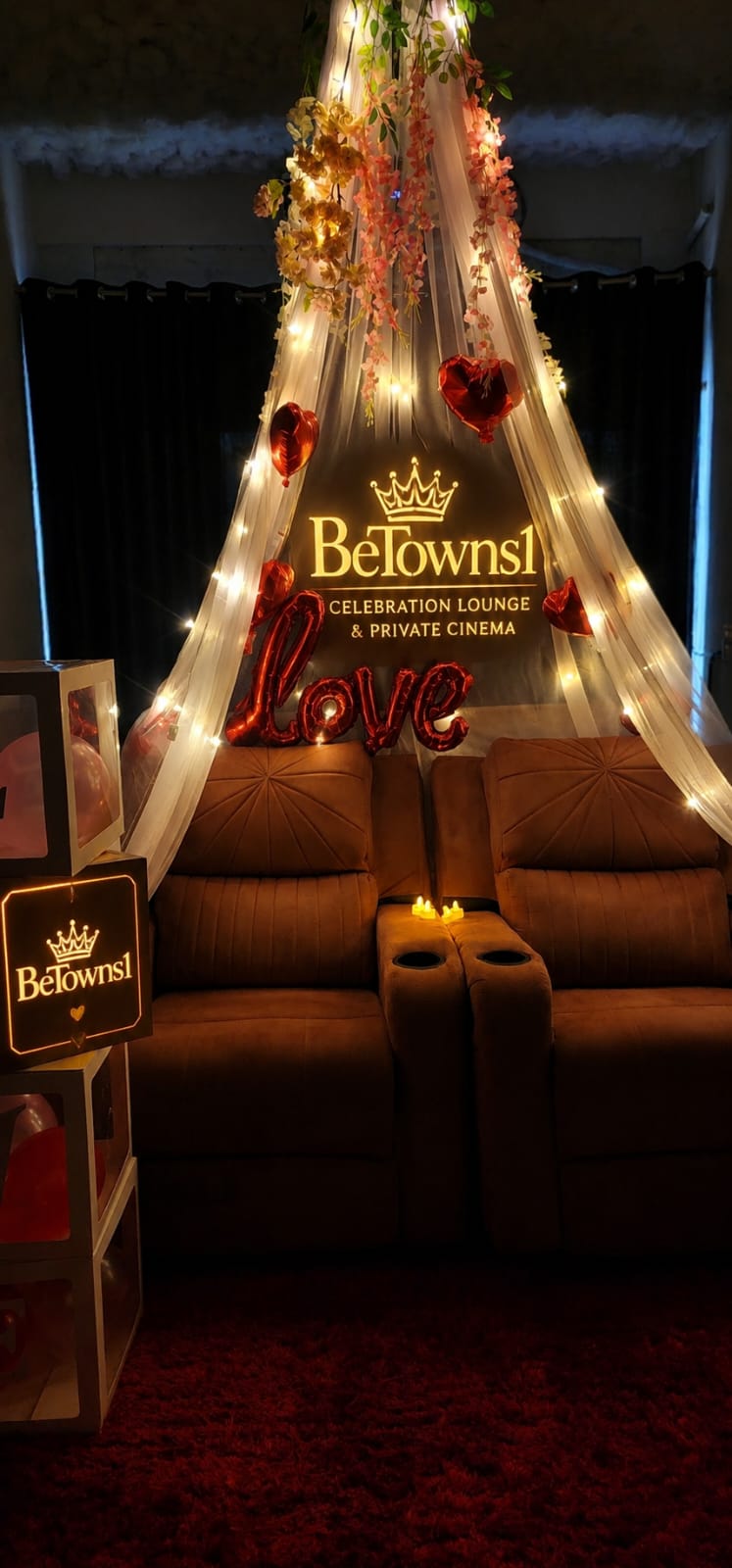 Curated snack counter with popcorn, beverages and themed treats for a private cinema screening