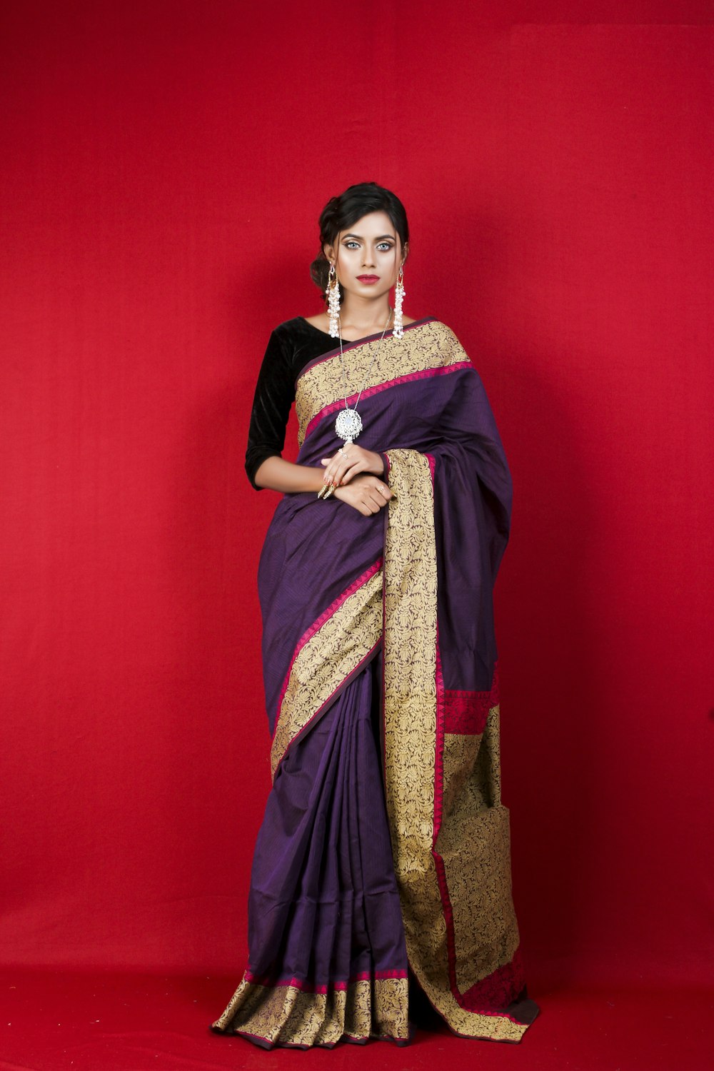 Hand-embroidered custom lehenga fabric detailing at Apreksha Design House atelier