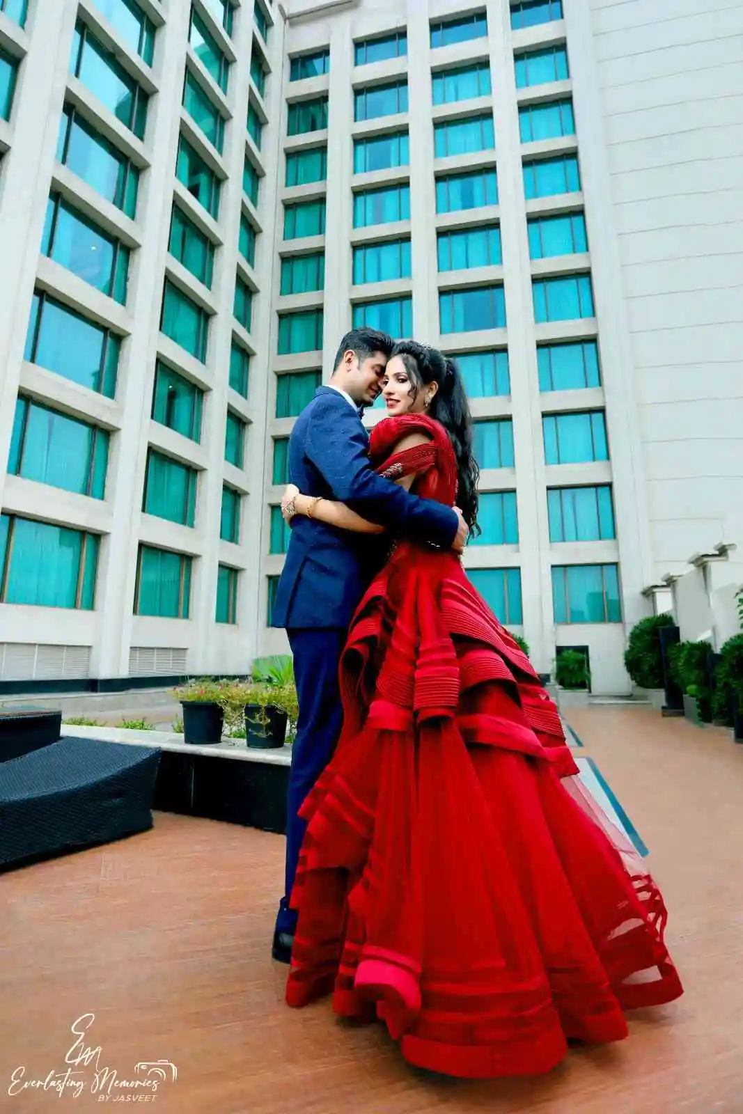 Couple in Red Dress and Blue Suit