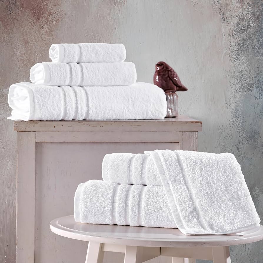 Premium white 100% cotton hotel towels manufactured by Karuna Textiles